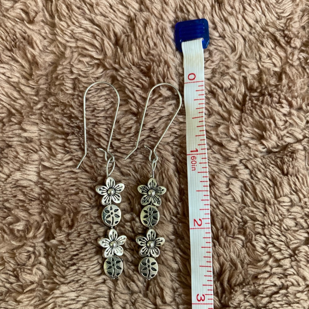 Silver Toned Metal Floral Drop Earrings - Picture 5 of 5